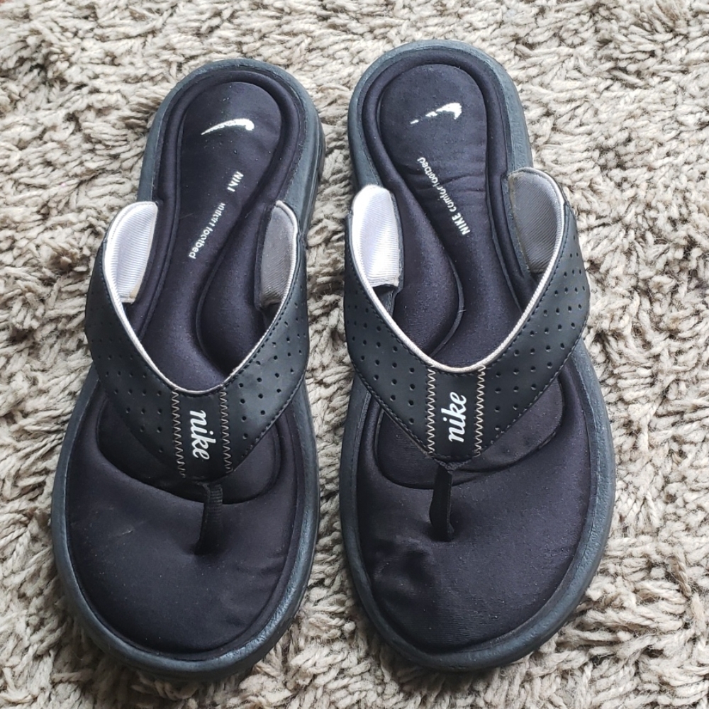 Nike Women's slip-on size 10W fits US 9